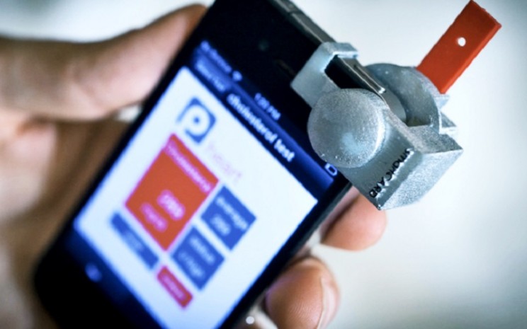smartCARD, alat untuk mengecek kolesterol melalui handphone di rumah - futurity.org
