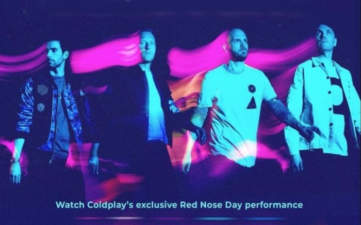 Berkat kecanggihan teknologi, Coldplay masih bisa menyapa penggemarnya lewat lagu terbarunya yang di tampilkan secara virtual.  - Coldplay 