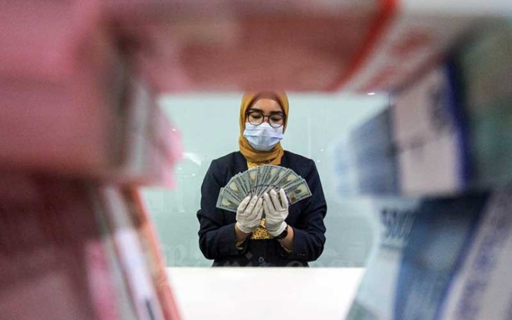 Kinerja emiten multifinance pulih setelah dihantam pandemi. Foto ilustrasi.. Bisnis - Arief Hermawan P
