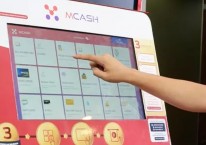 Tampilan digital kiosk yang dikembangkan PT M Cash Integrasi Tbk. (MCAS)./mcash.id