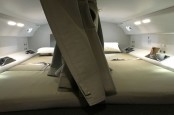 Mengintip Tempat Tidur Rahasia Pilot di Pesawat Saat Penerbangan Panjang